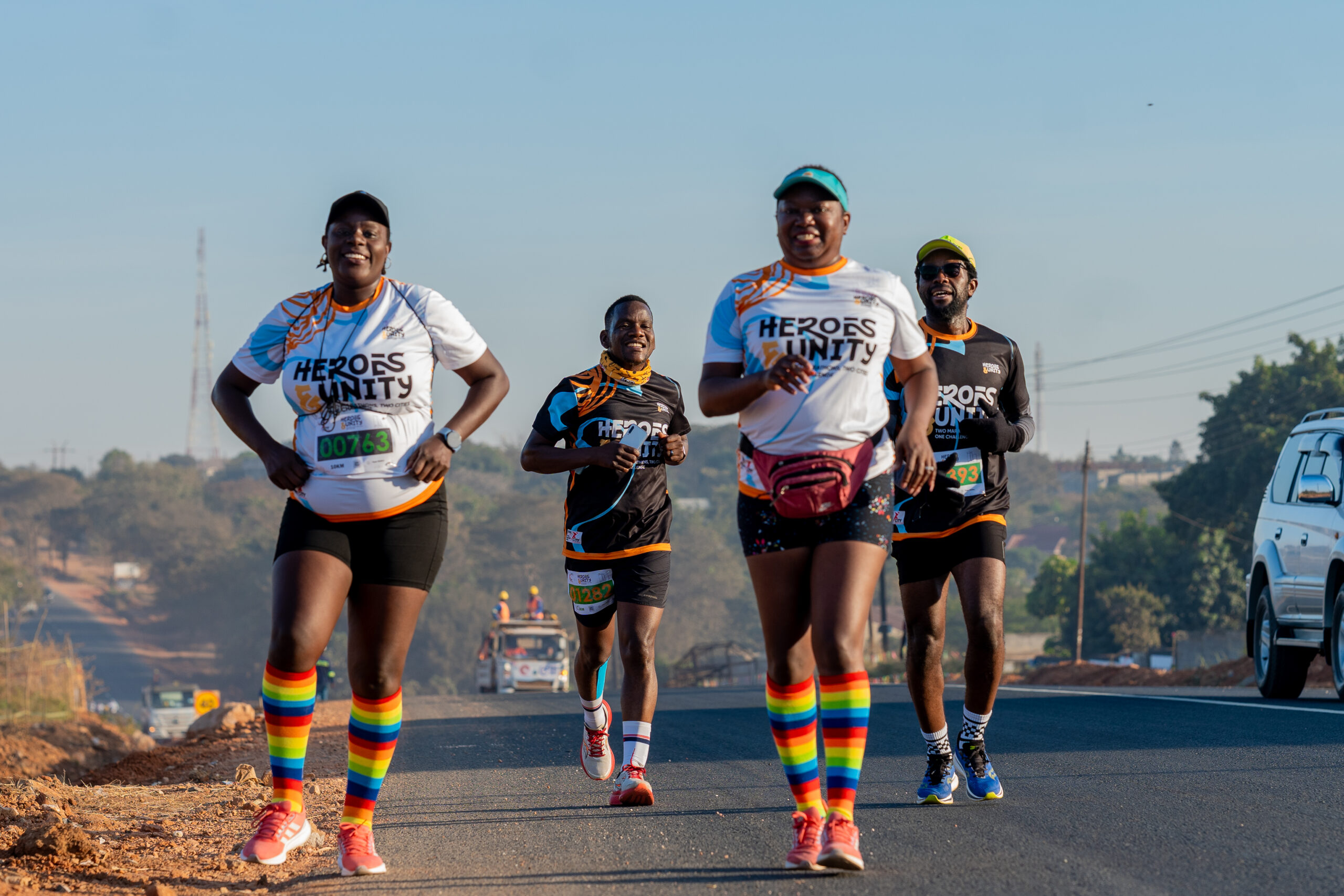 Group of runners in colorful socks enjoying the race